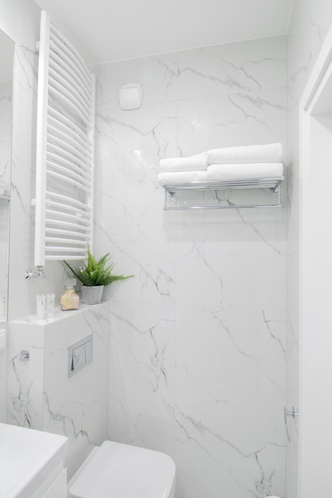 Warsaw Seasons By Alluxe Boutique Apartments Varsóvia Quarto foto